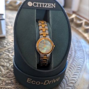 Hold and silver mother of pearl Eco Drive Citizen watch